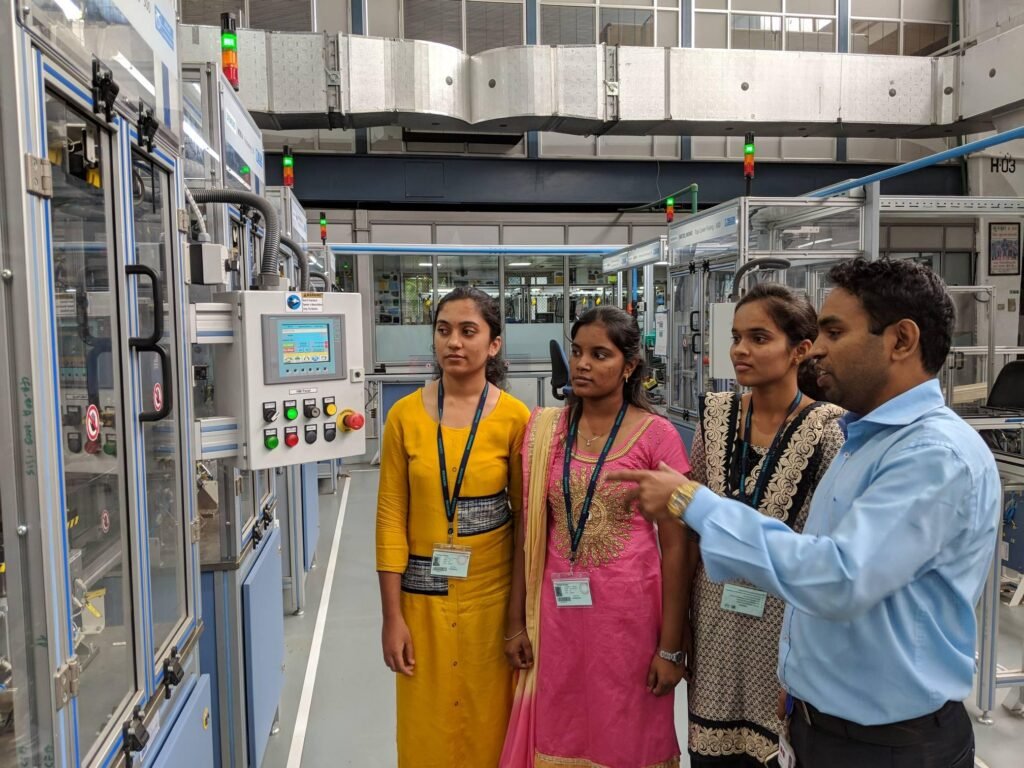 Indian students and industry professionals collaborating on education and skills development