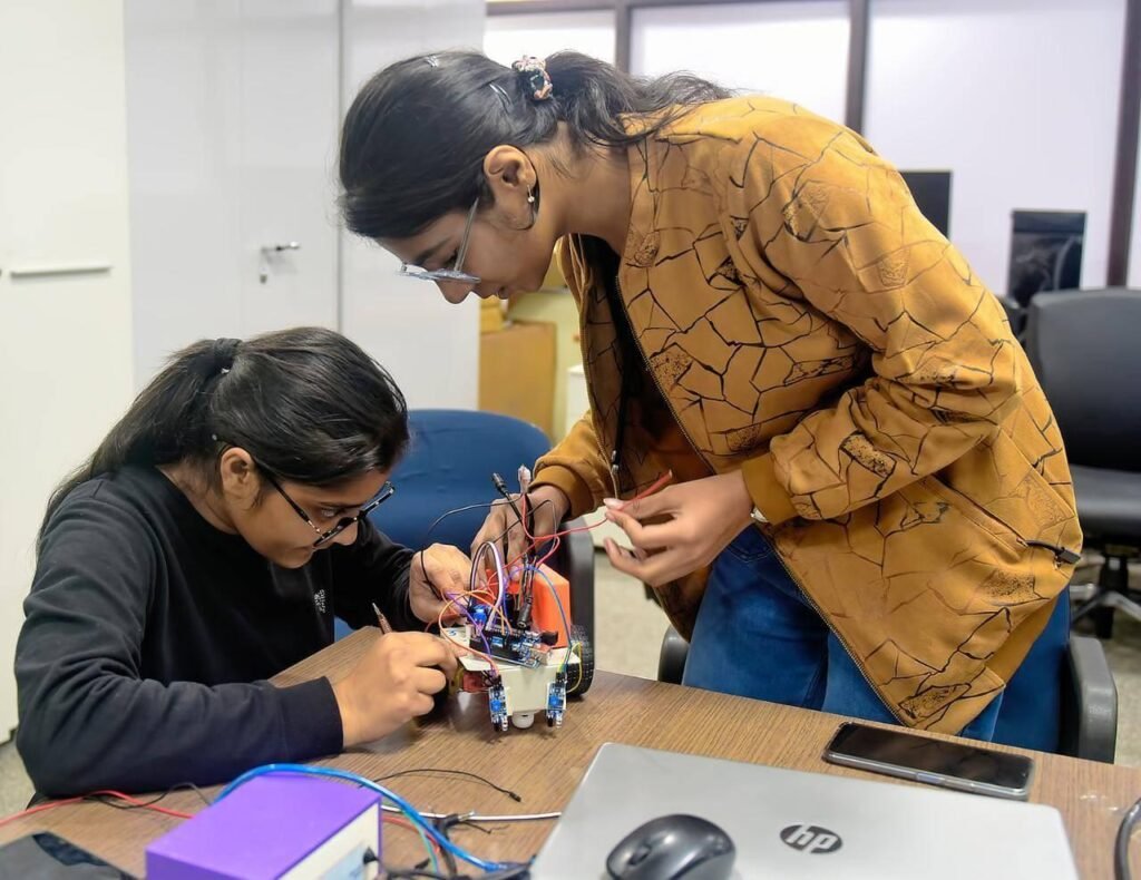 Young Indian innovators developing a research and technology project
